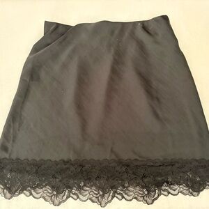 Black silk skirt with lace trim